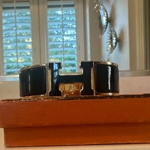 Black enamel Hermes Clic clac bracelet